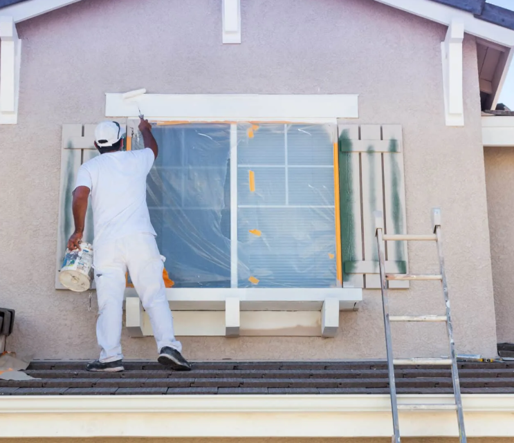 artisan applying finish